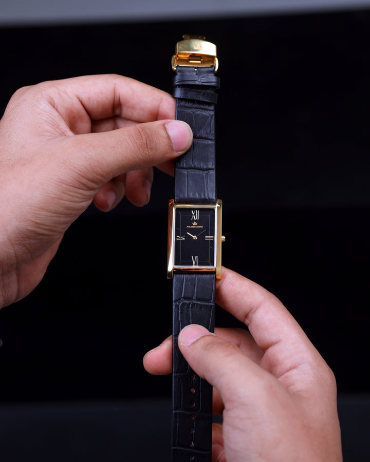 Front view of Franklord Royal Black Heritage rectangular watch with gold case and black leather strap