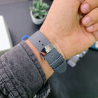 Franklord Ash Luxe watch grey leather strap with signature buckle on wrist
