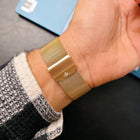 Back clasp view of rose gold mesh strap with Franklord logo engraving