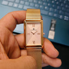 Vertical close-up of rose gold rectangular dial of the Franklord Champagne Luxe watch