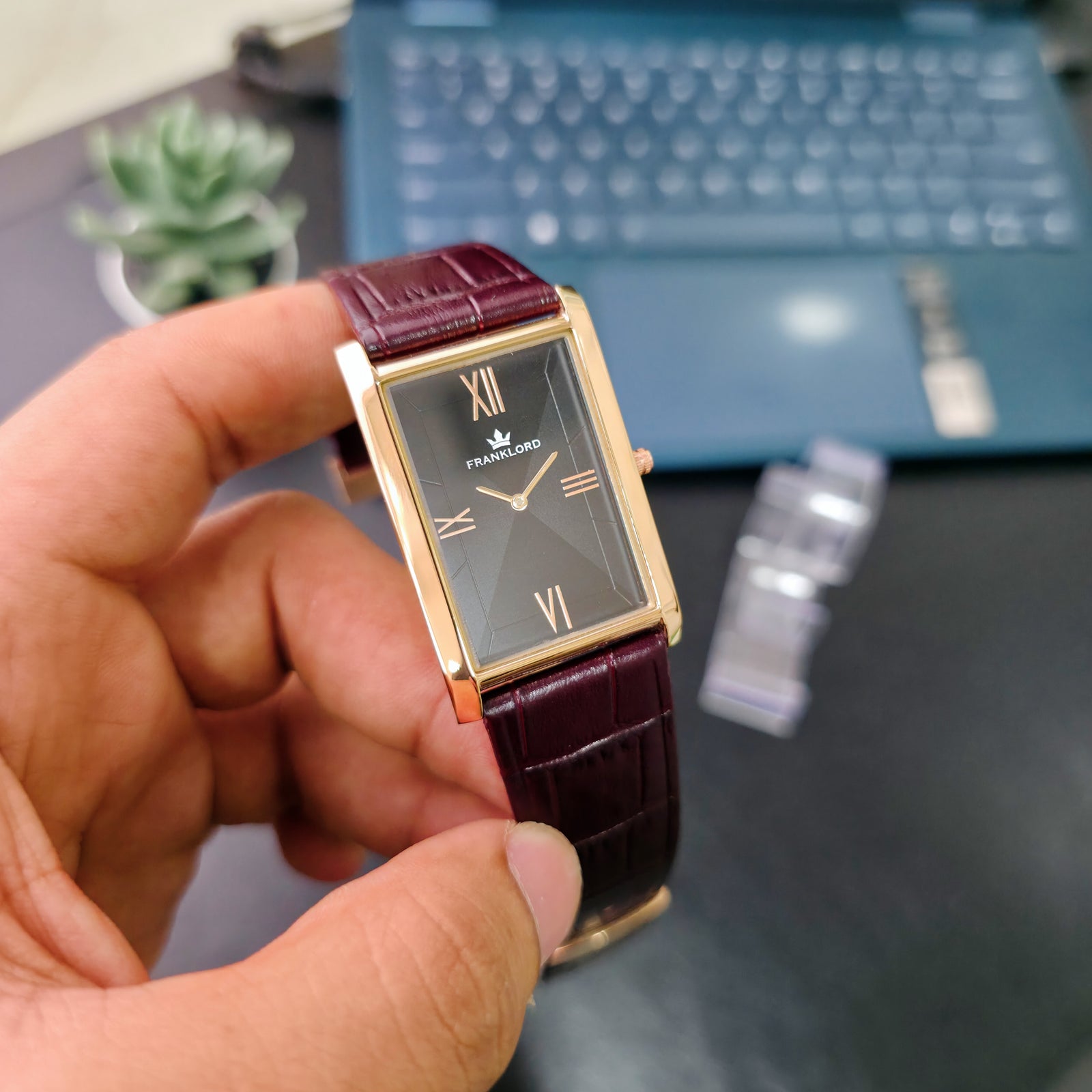Franklord The Indian Tank Black Royale watch close-up showcasing black sunburst dial and rose gold case