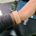 Back view of Franklord Dusky Royale leather strap in beige, worn on wrist