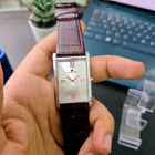 Straight front view of Franklord Ivory Crown highlighting elegant Roman layout on sunburst dial