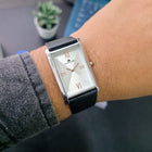 Franklord Monarch Silver worn on wrist with formal outfit, showcasing refined and minimalist elegance