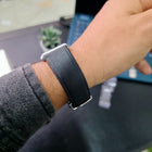 Side view of black genuine leather strap of Franklord Monarch Silver watch on wrist