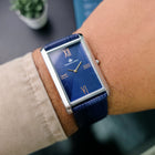 Back view of blue crocodile-textured strap of Franklord Ocean Crest watch on wrist