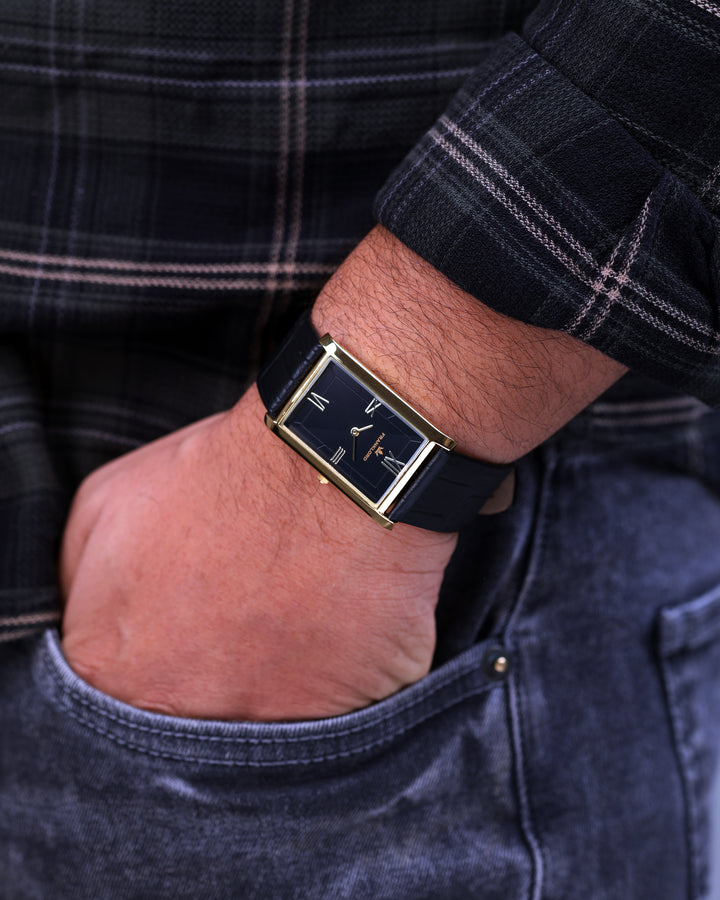 Indian Tank Royal Black Heritage watch styled in jeans pocket with black strap and gold case