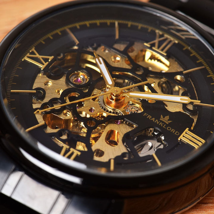 Franklord Mechanis Eclipse Noir Automatic Skeleton Watch showcasing intricate gold and black skeleton dial with visible mechanical movement.