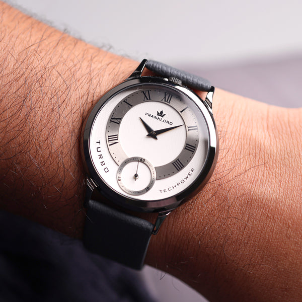 Franklord Split Turbo Graphite Crest watch worn on wrist showing its sleek and minimalist silver dial.