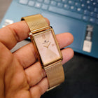 Front view of Franklord The Indian Tank Champagne Luxe watch with rose gold rectangular dial and mesh strap